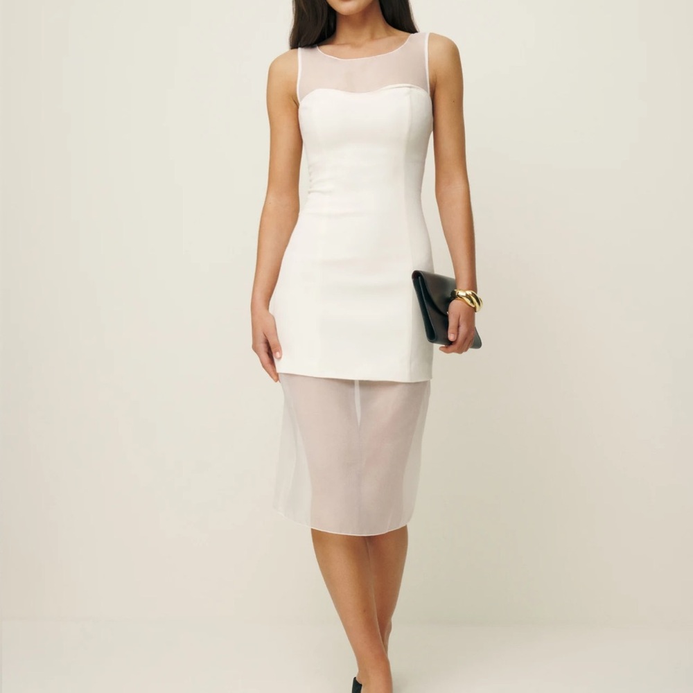 Never used reformation eydie dress. Dress was final sale and didn’t suit me
